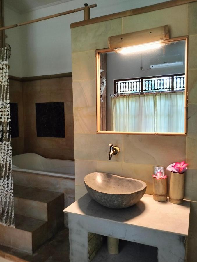 Kaia Lovina Guest House Junior Suite Esterno foto
