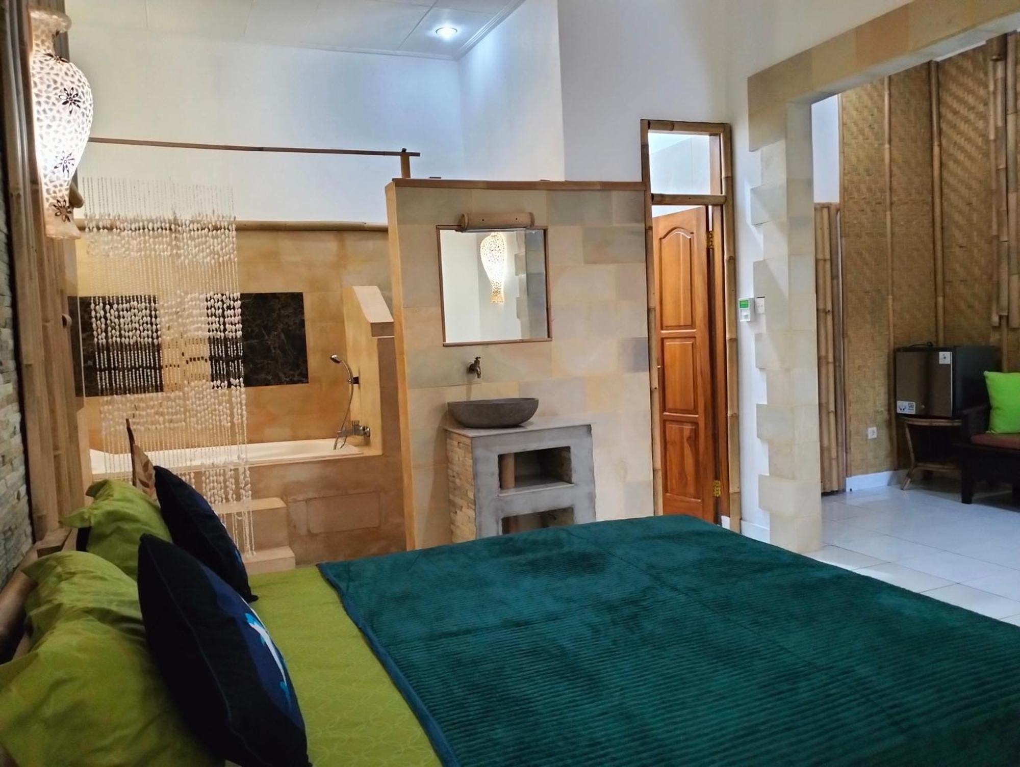 Kaia Lovina Guest House Junior Suite Esterno foto